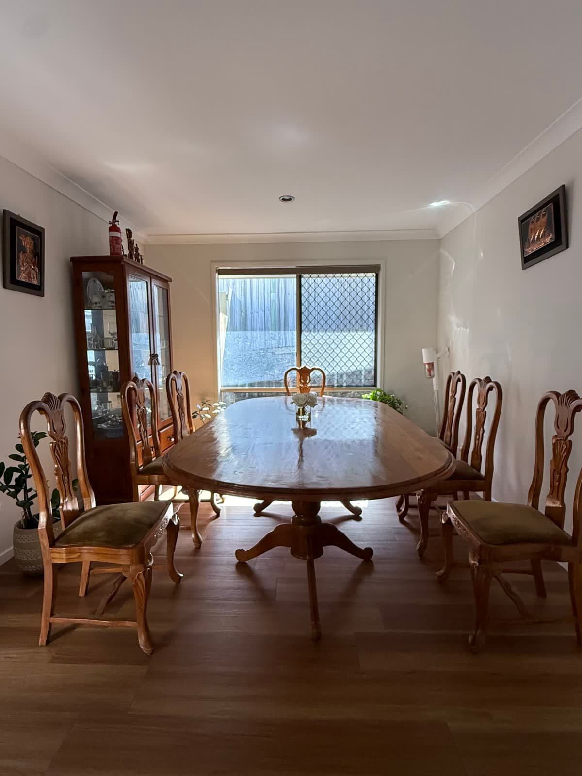 Oval Teak Dining Table and 8 Carved Chairs