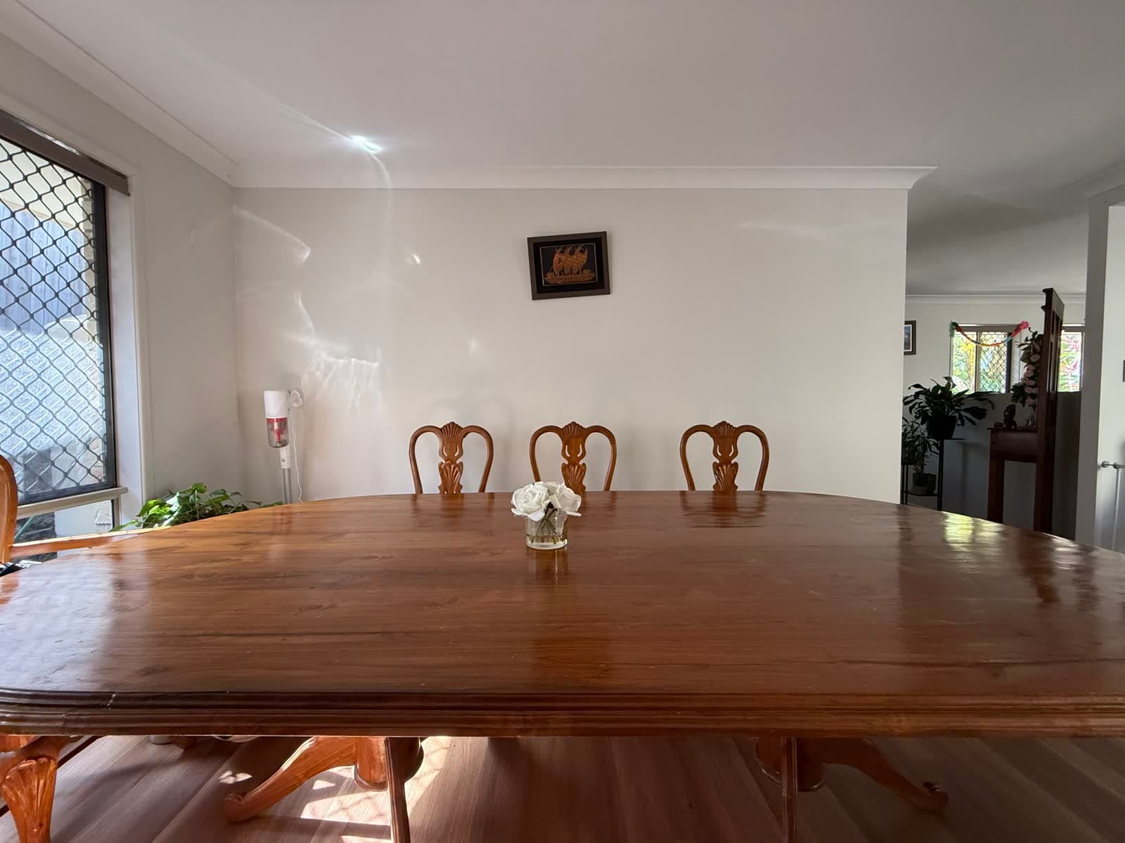 Oval Teak Dining Table and 8 Carved Chairs photo 6