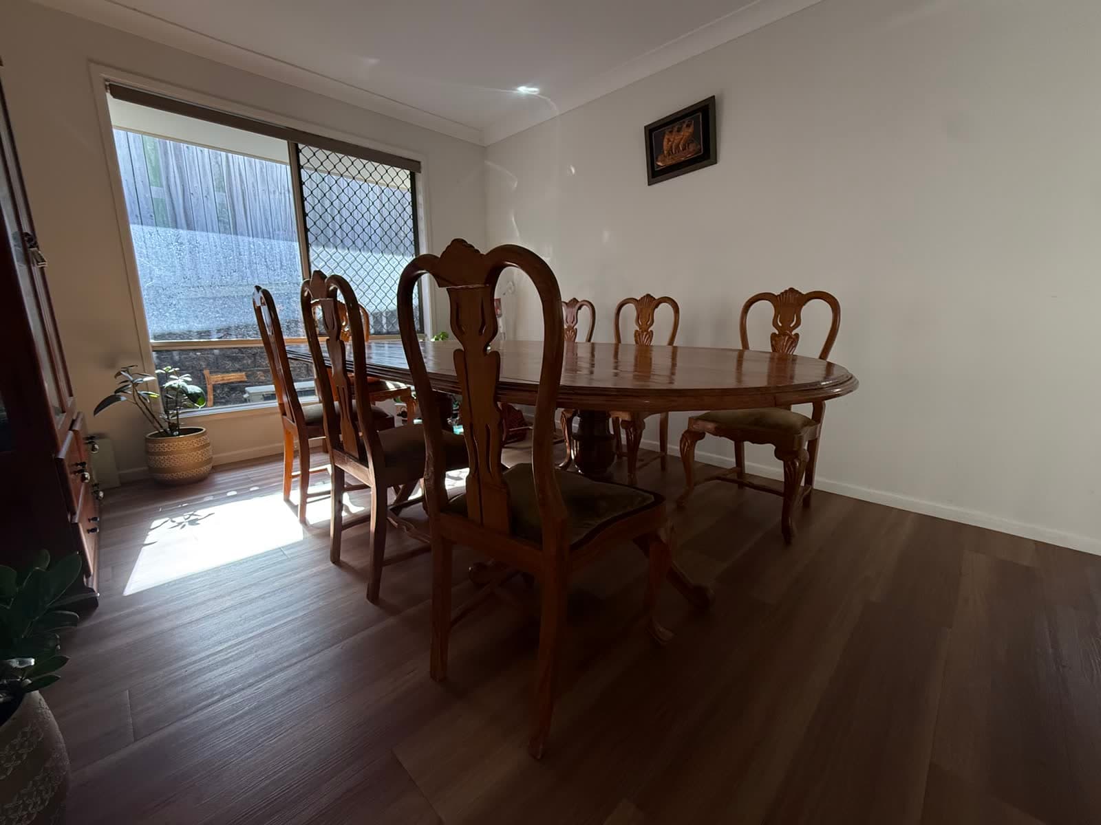 Oval Teak Dining Table and 8 Carved Chairs photo 8